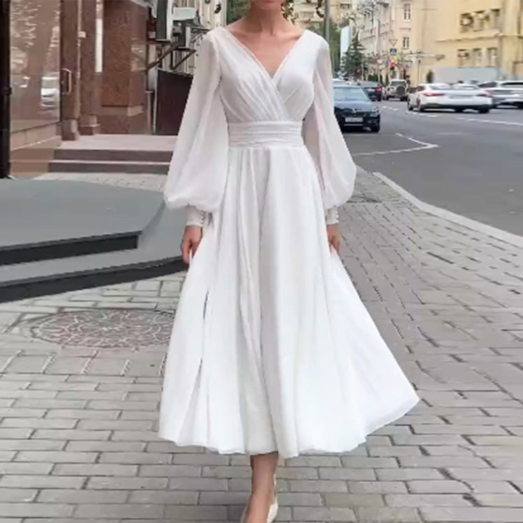 Vestido blanco puro de manga larga con cuello en V y espalda