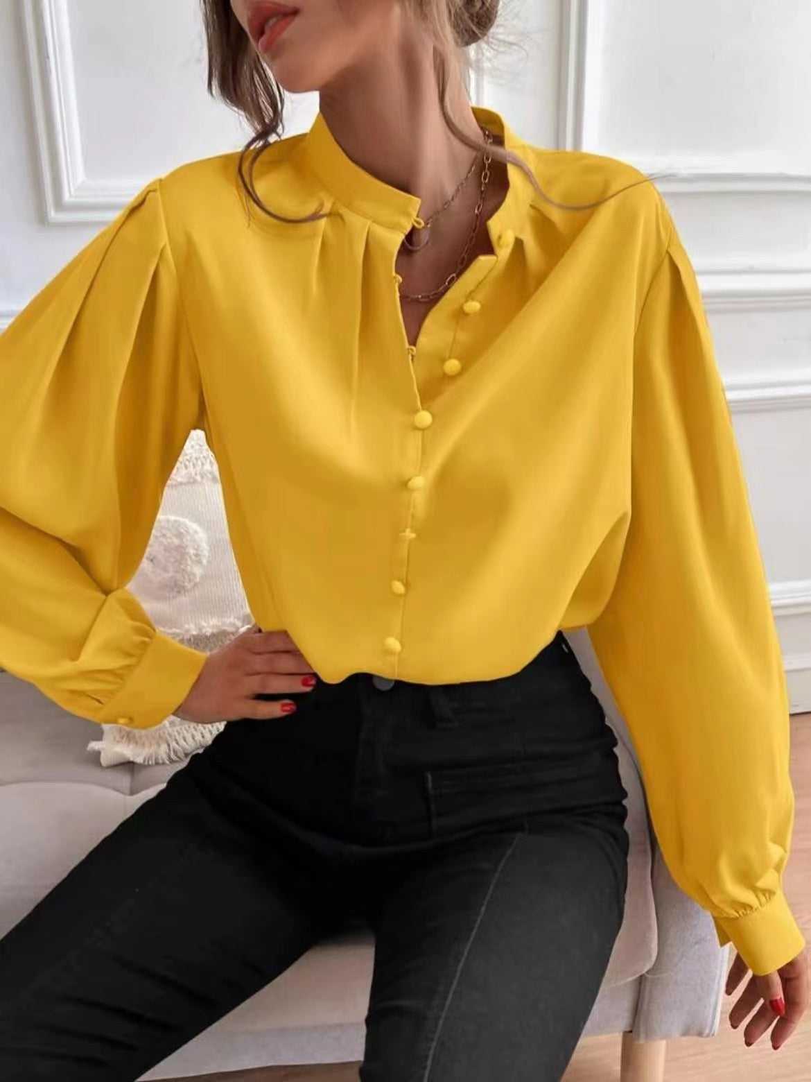 Camisa de mujer de un solo pecho con cuello redondo y manga larga de color liso estilo viajero