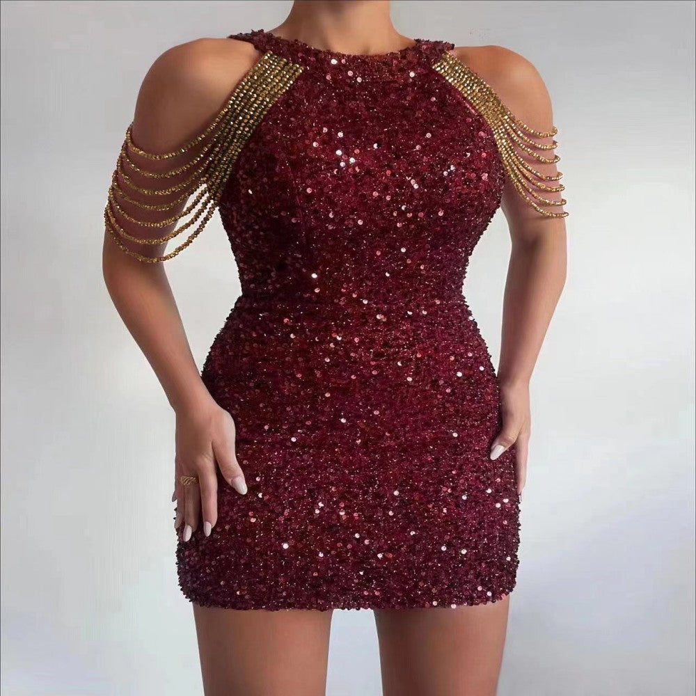 Vestido tubo con lentejuelas y flecos de cristal halter