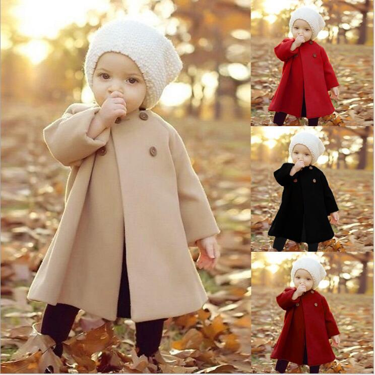 Children wear a trench coat