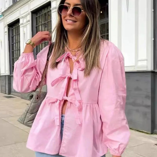 Top camisero de manga larga con lazo y moda urbana para mujer