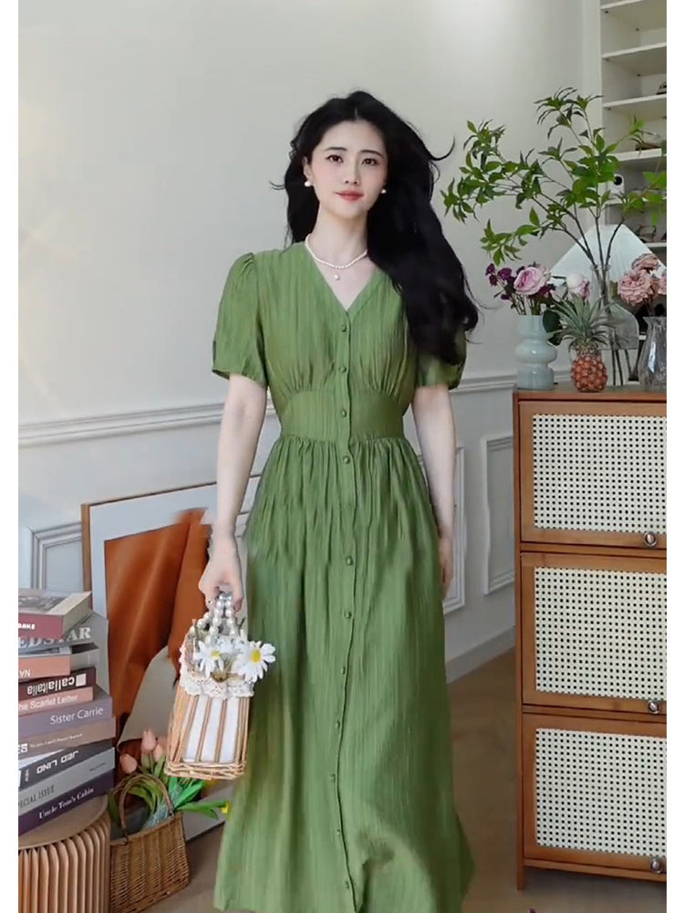 Vestido verde con cuello en V y cintura estilo mujer